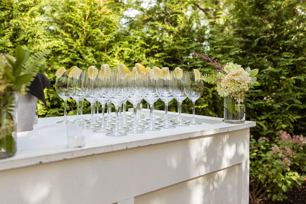 Wine glasses at bar at Cafe Cortina wedding in Farmington Michigan