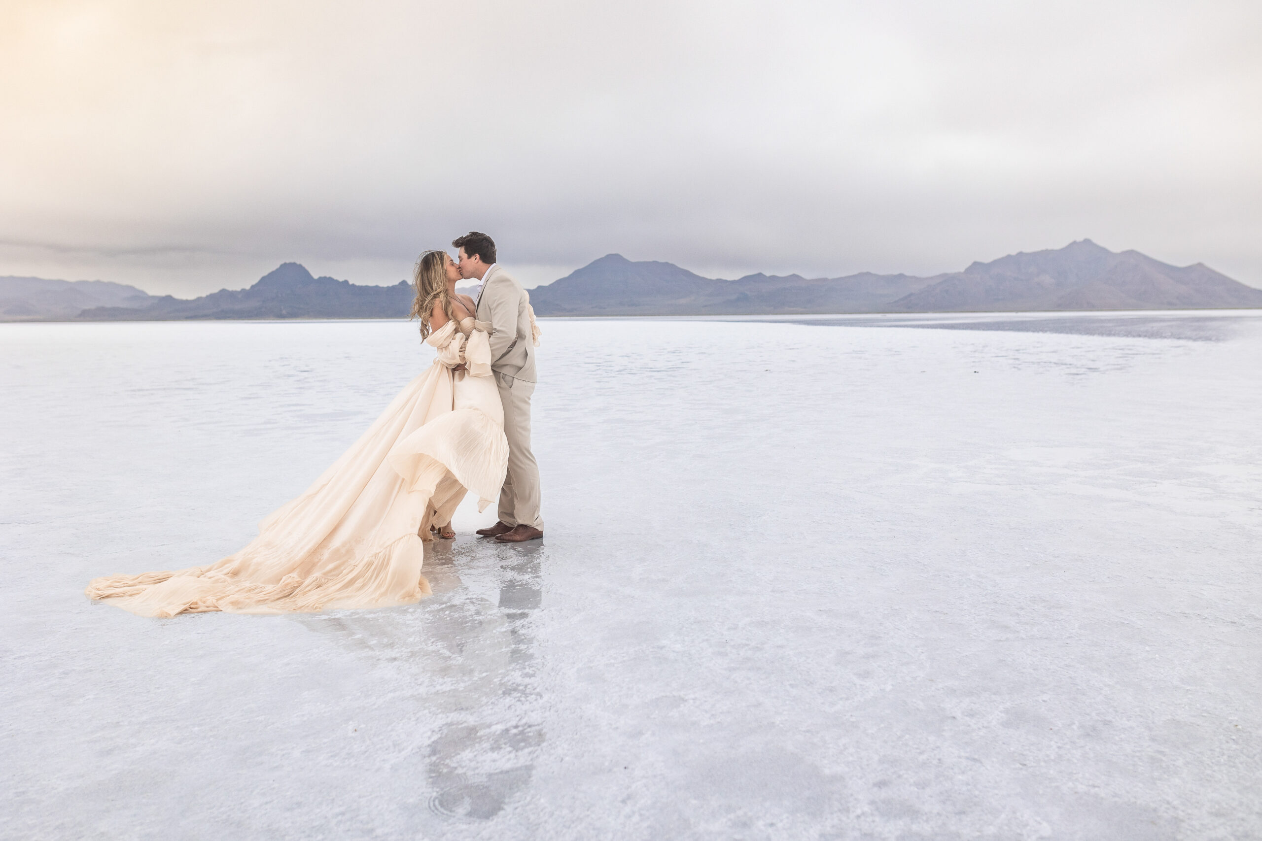 Bride and groom on Utah salt flats during elopement