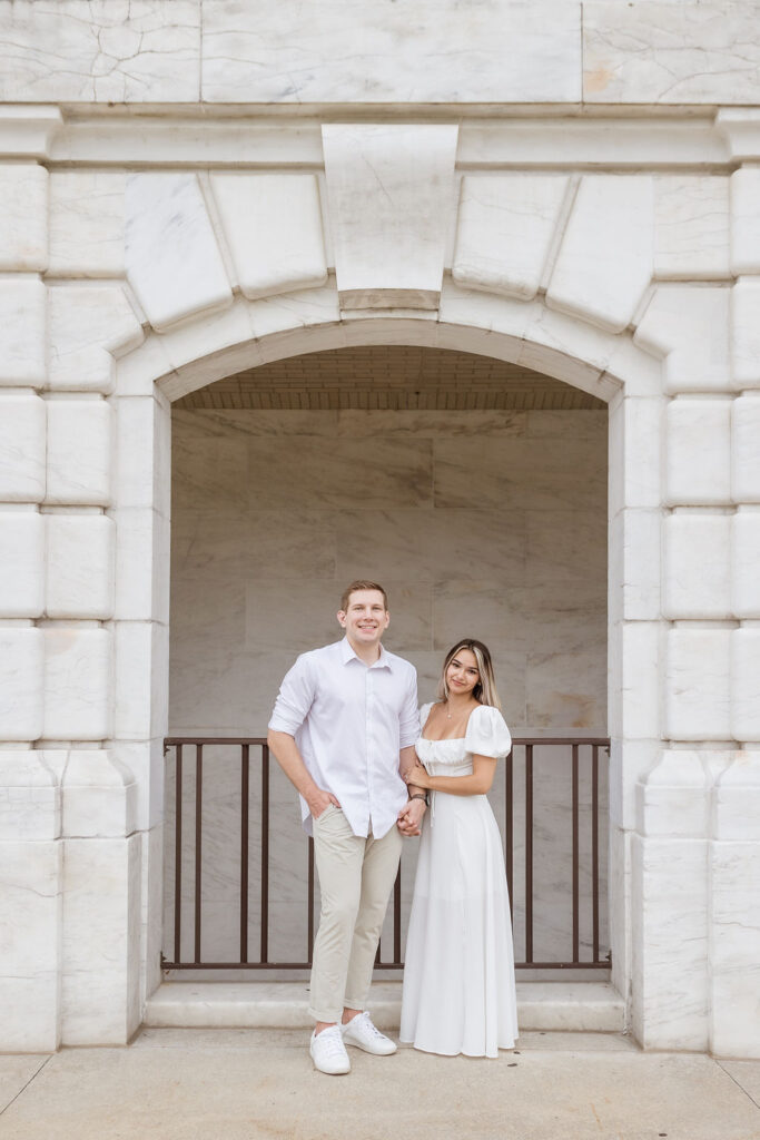 Man and woman dressed in white for Detroit Engagement Photos by Savvy Shoots Photography