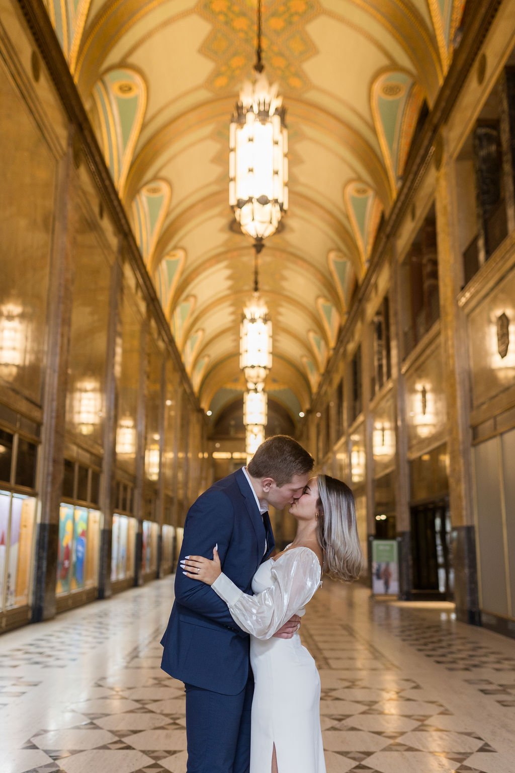 Man and woman kissing during engagement photos in Detroit Michigan