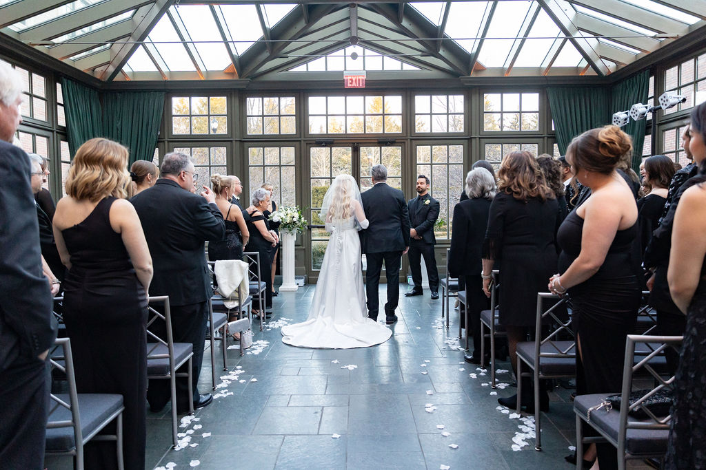 Father giving way bride at Royal Park Hotel Conservatory