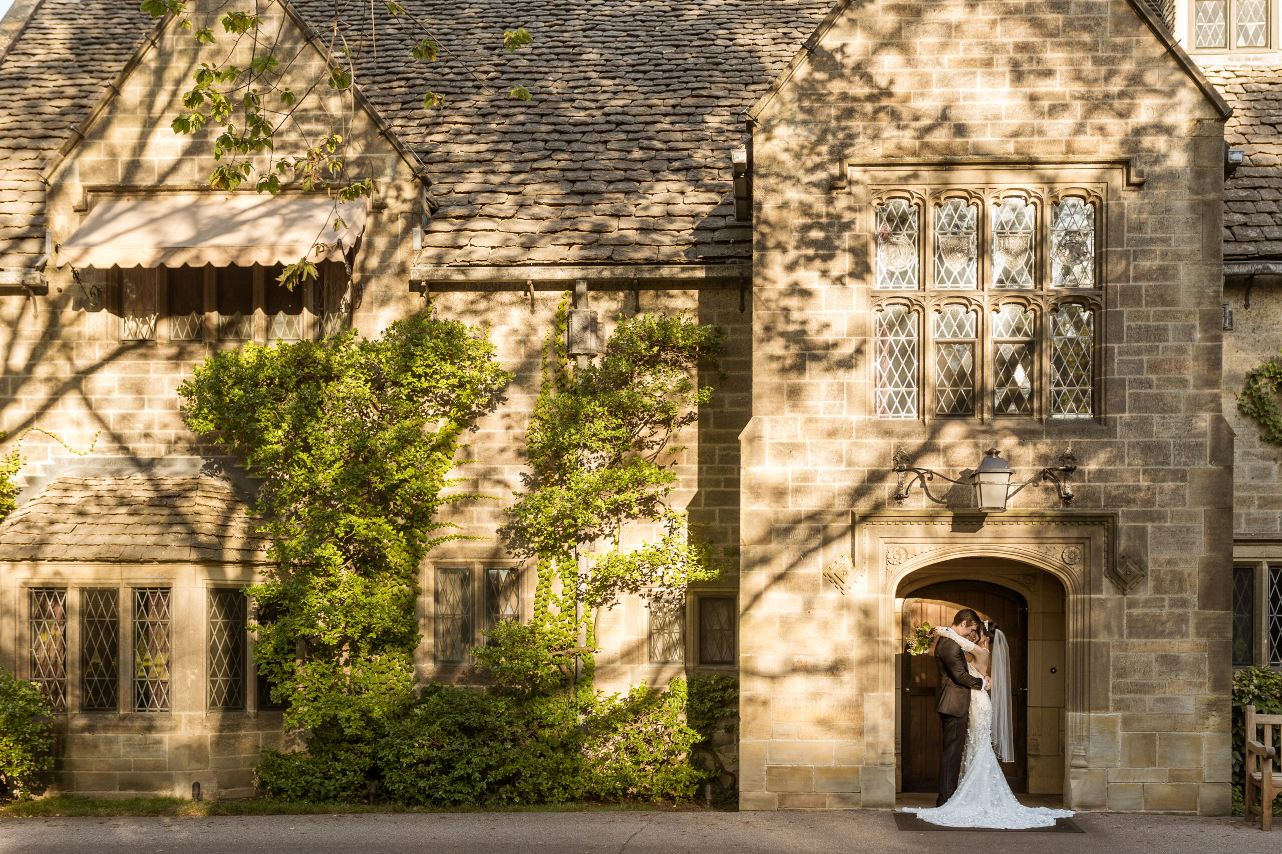 Bride and groom in entrance of The Ford House by Wedding Photographer Savvy Shoots Photography