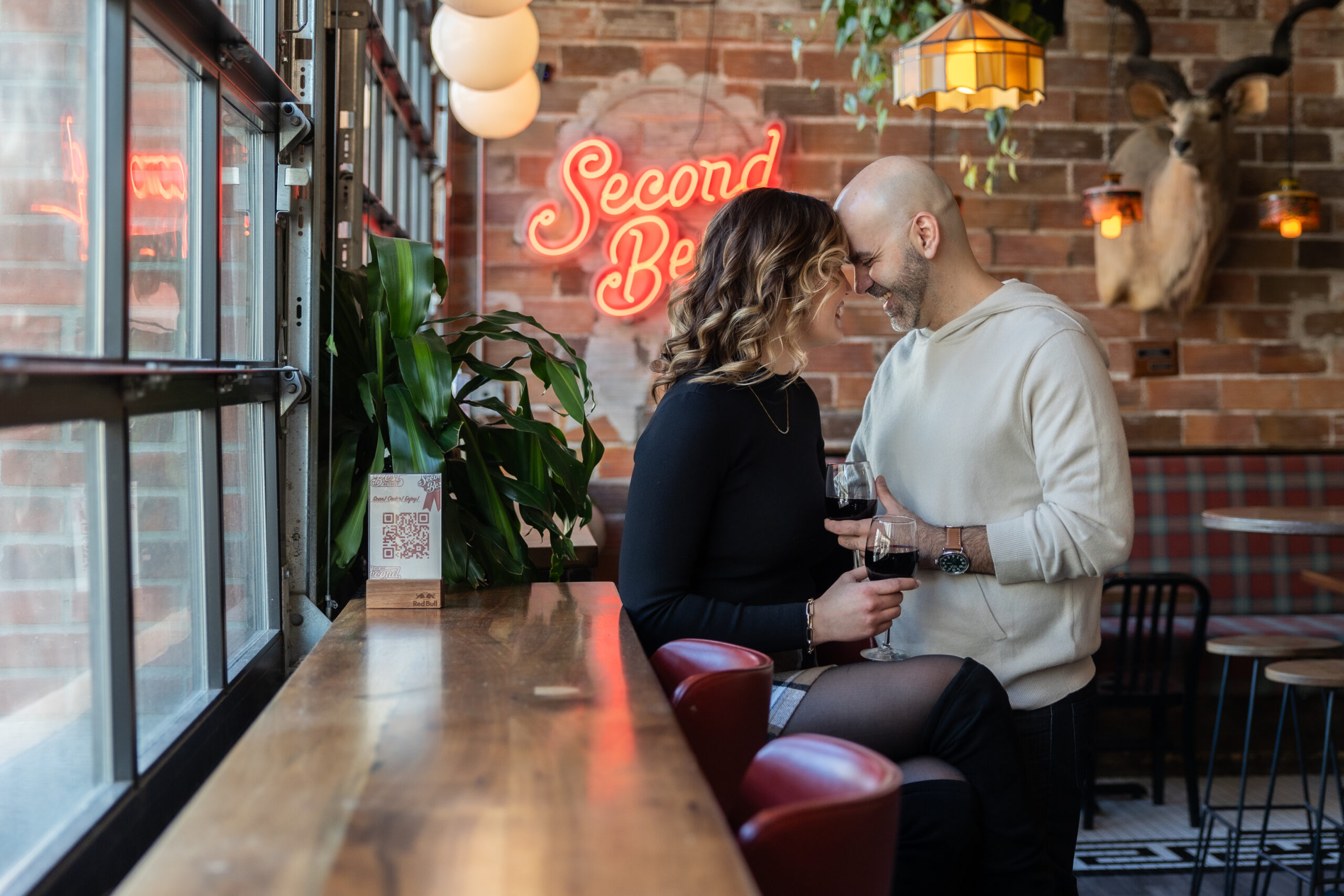 Man and woman taking engagement photography in Downtown Detroit