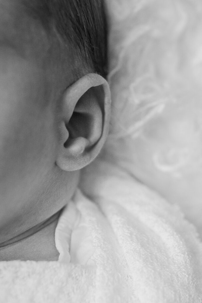 Close up of baby's ear for newborn photography in Sterling Heights Michigan