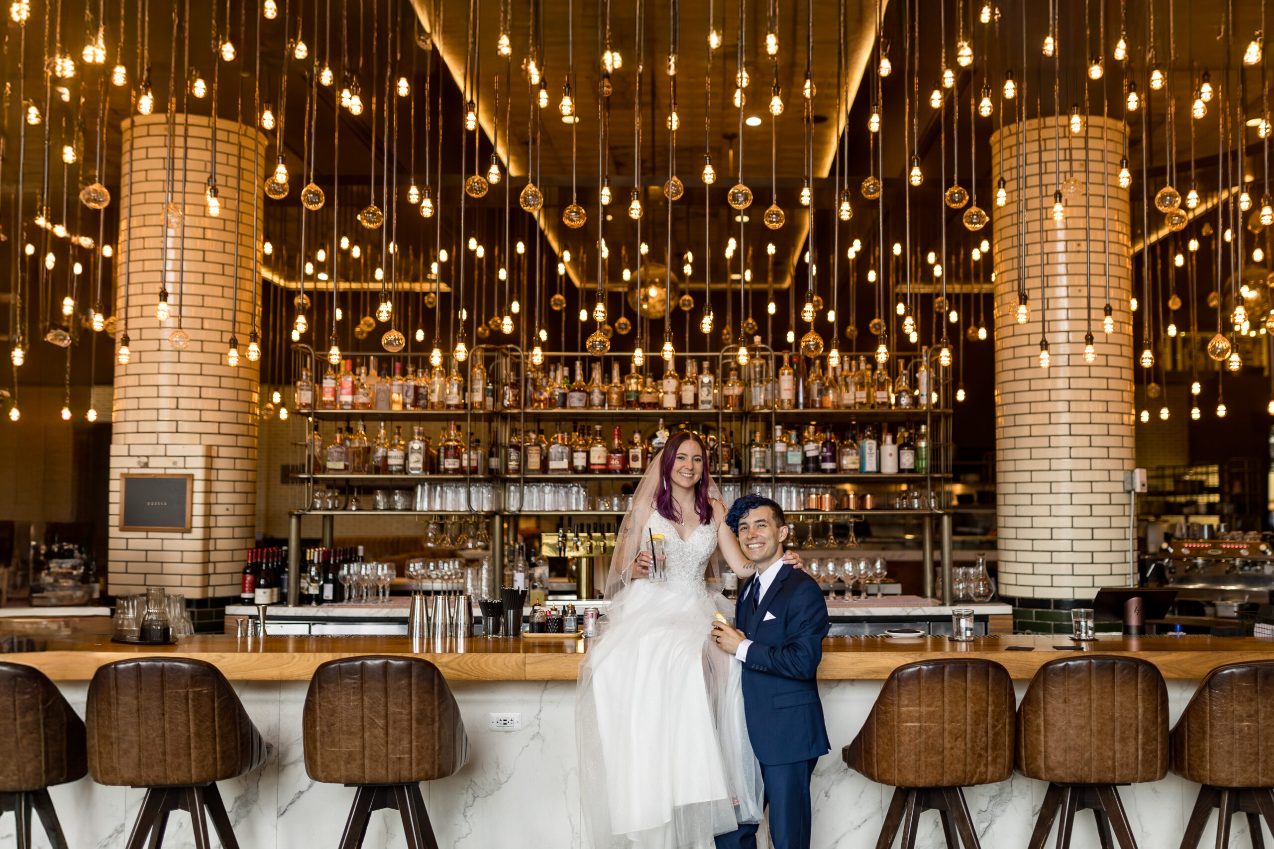 Bride and groom posing for wedding photography in downtown Detroit