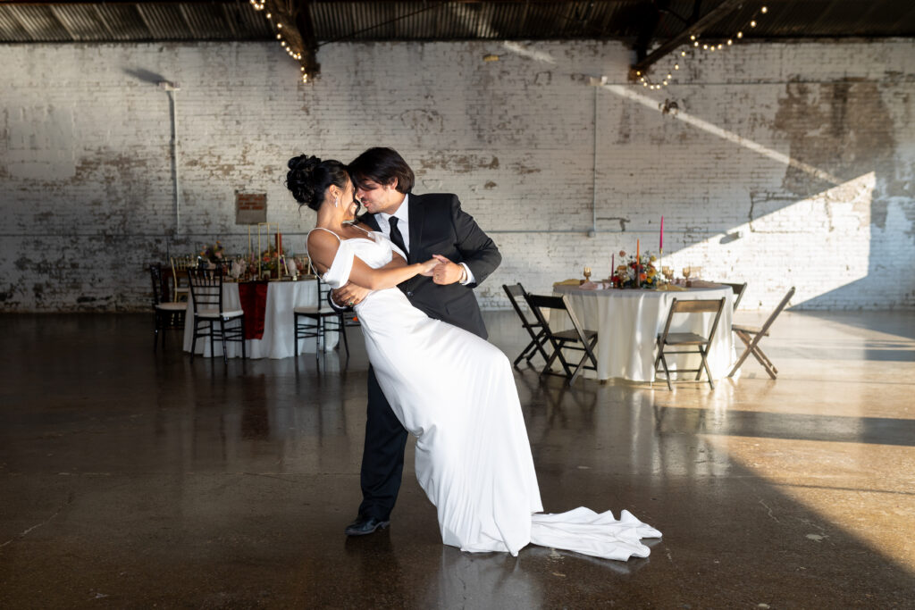 Bride and groom in Industrial Wedding Venue in Oxford Michigan by Savvy Shoots Photography