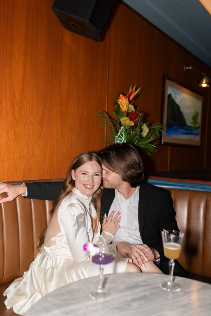 Couple at bar for engagement photography with Savvy Shoots