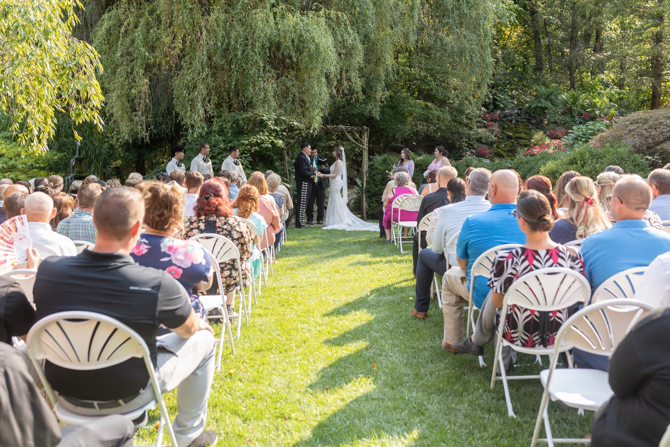 Man and woman getting married in Owosso Michigan by Savvy Shoots Photography