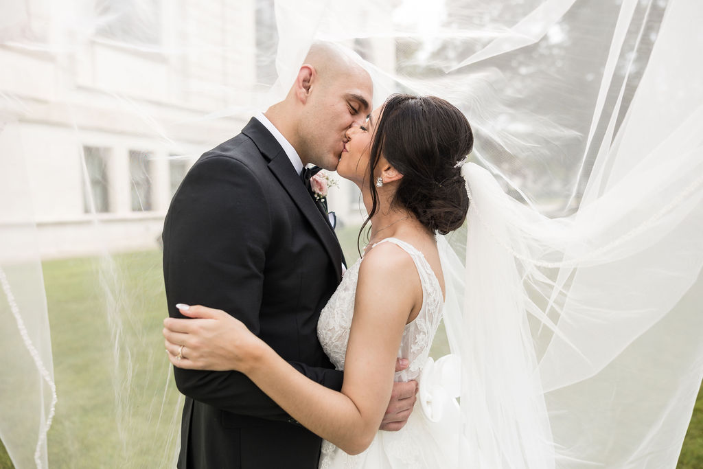 Bride and Groom Kissing during Downtown Detroit wedding photography