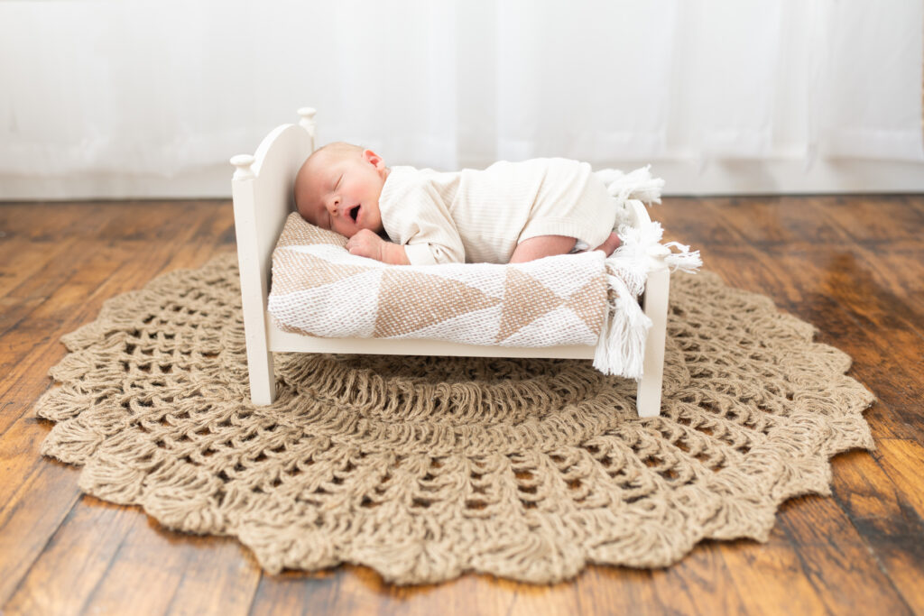 newborn baby in studio during newborn photography in Oakland County