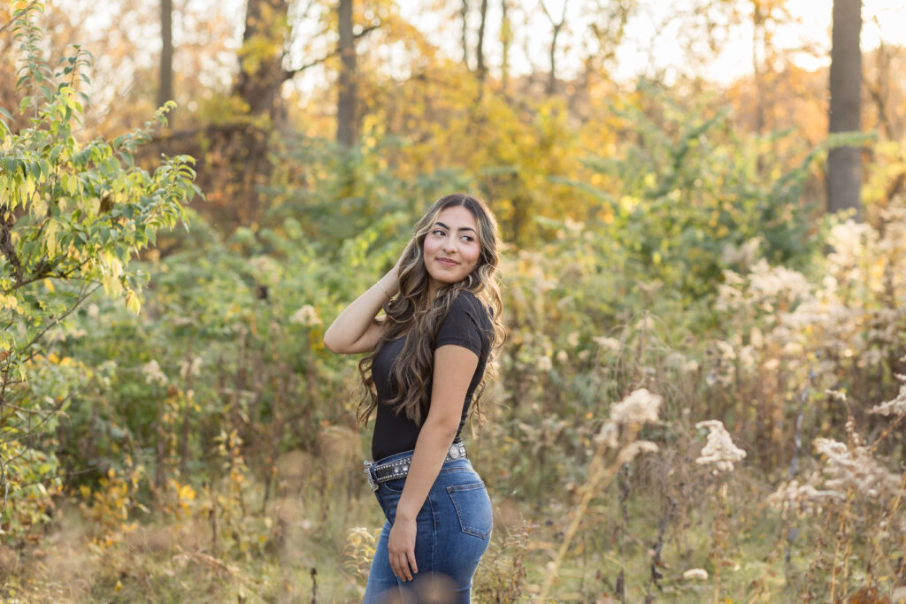 Senior posing for senior pictures in Rochester Hills MI