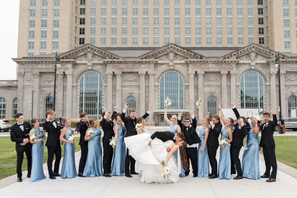 Bridal Party poses in front of Michigan Central for Detroit Wedding Photography