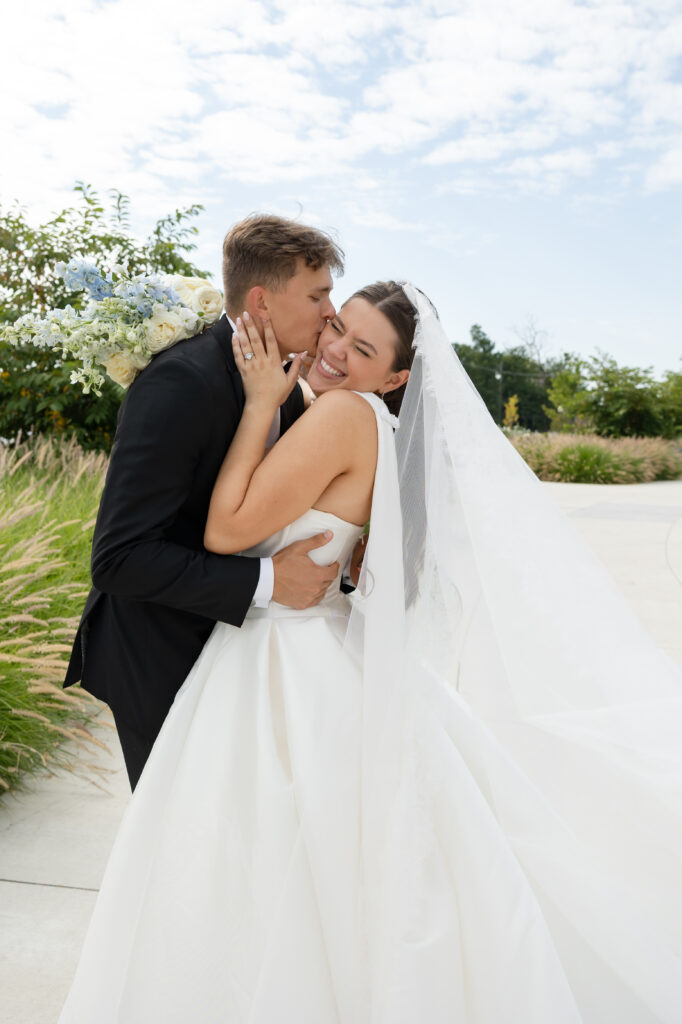 Bride and Groom pose for wedding photography in Detroit MI