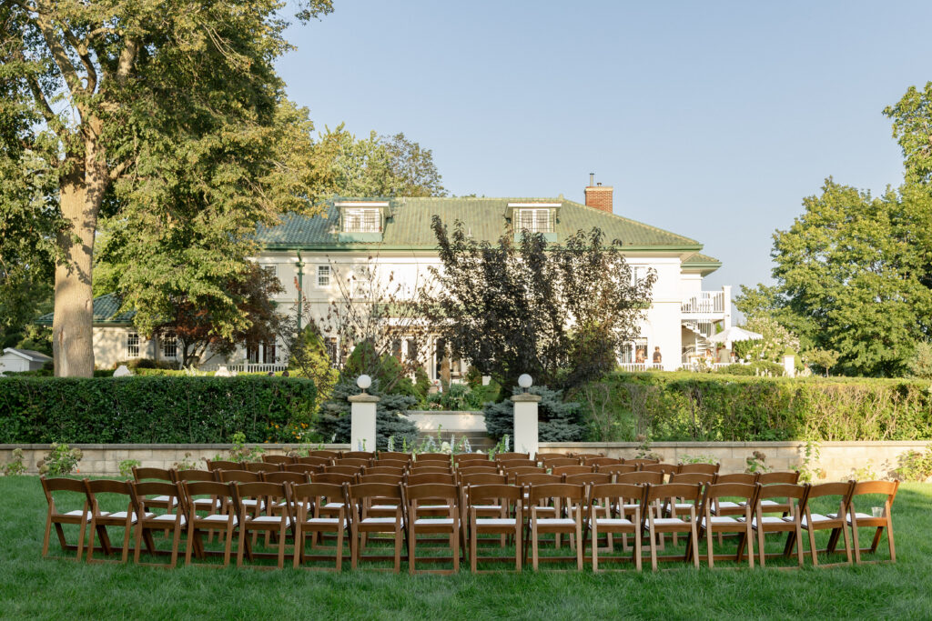 brown chairs outside for ceremony space at Belvedere Estate